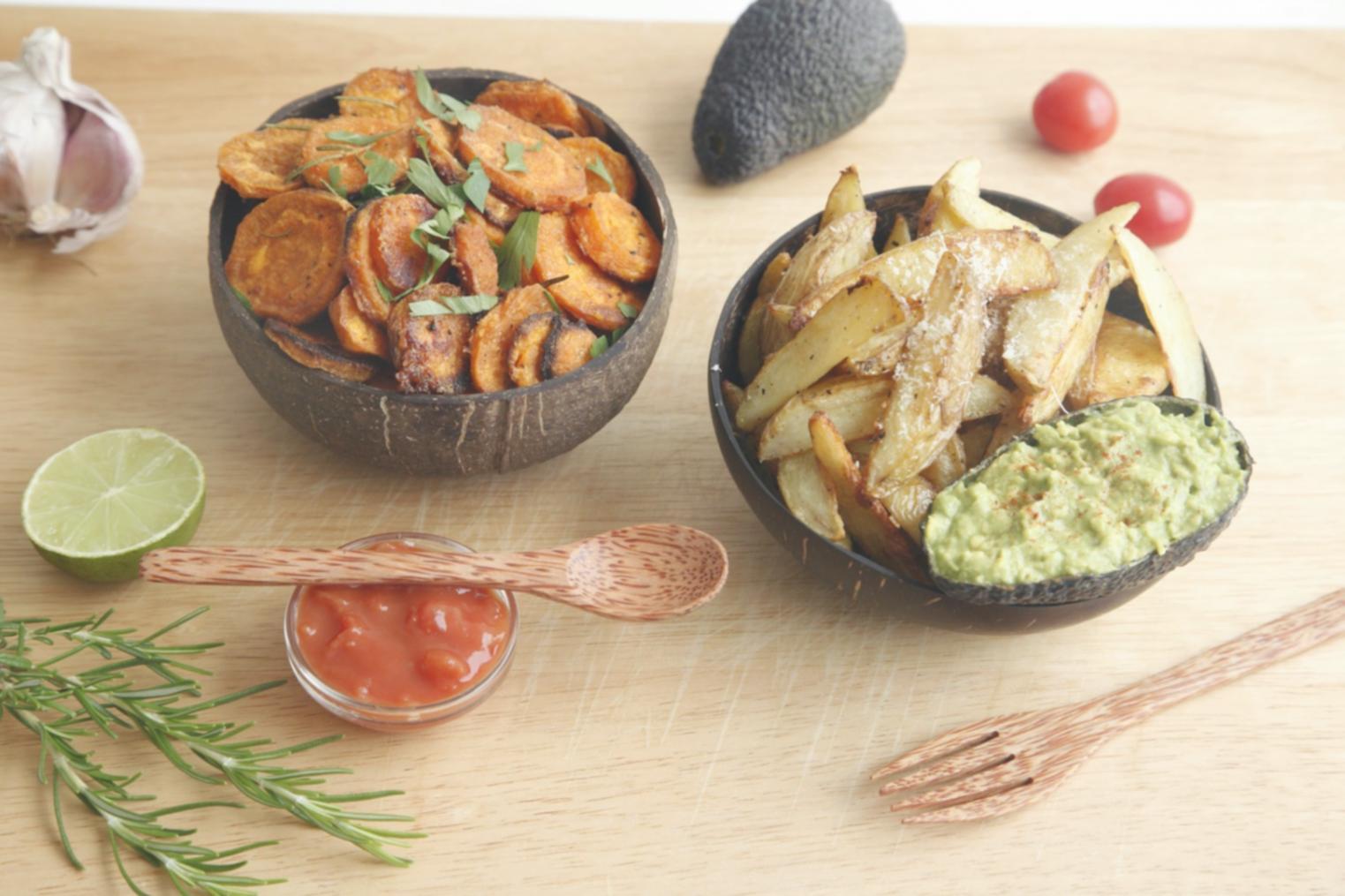 Team member portioning meals in our preparation area